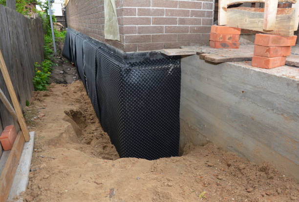 Happy homeowners after waterproofing job in Merchantville